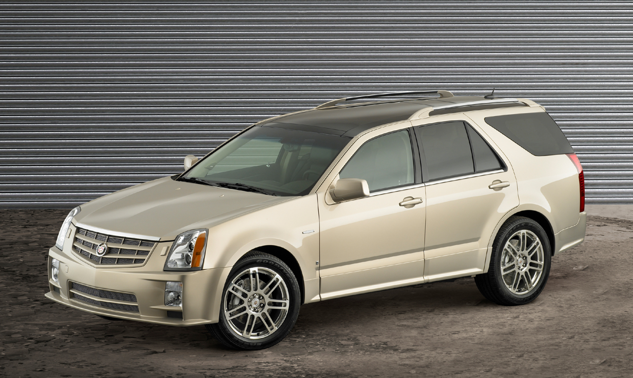 Cadillac SRX I: 12 фото